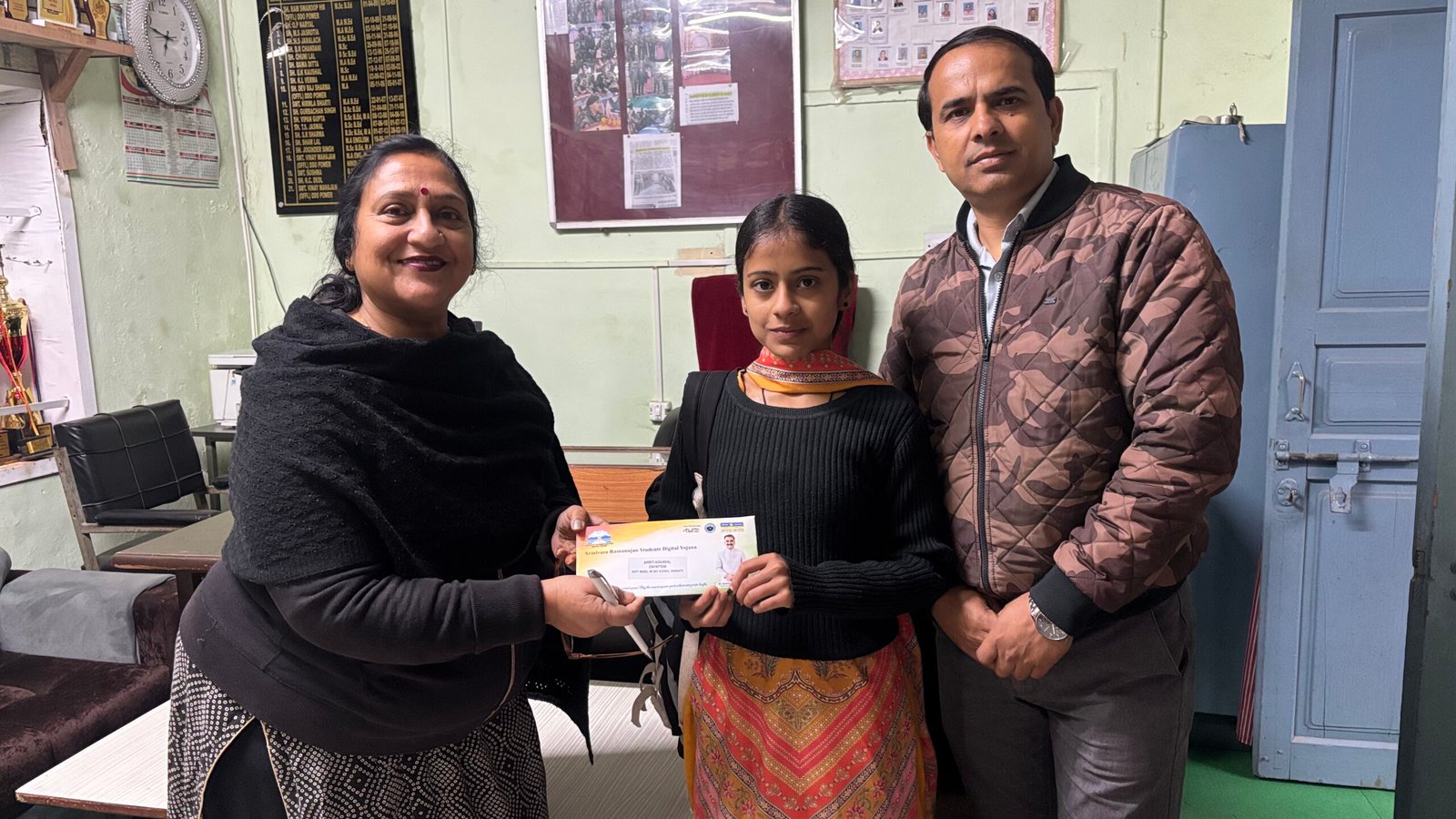 Student receiving digital education award at PM SHRI School